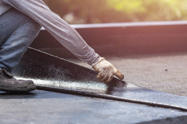 Professional Basement Waterproofing technician working in Bluffton, IN